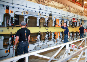 The first spar being assembled at Boeing's Renton Plant.